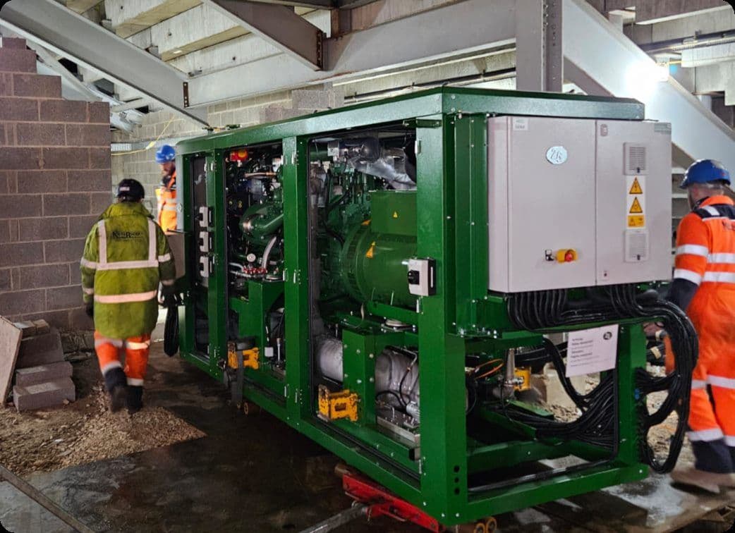 Installers moving the 180 kW Hydrogen-ready CHP engine into place at Deepdale